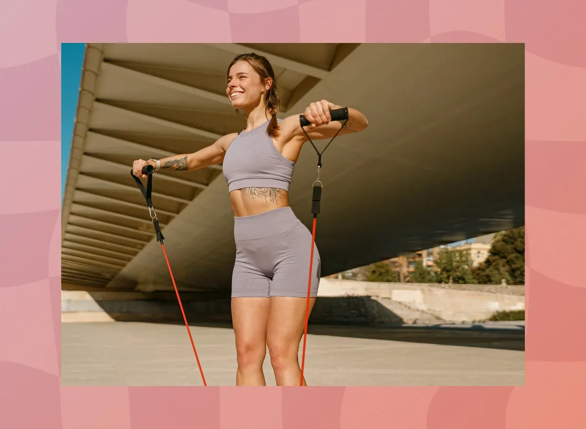 fit woman using resistance bands