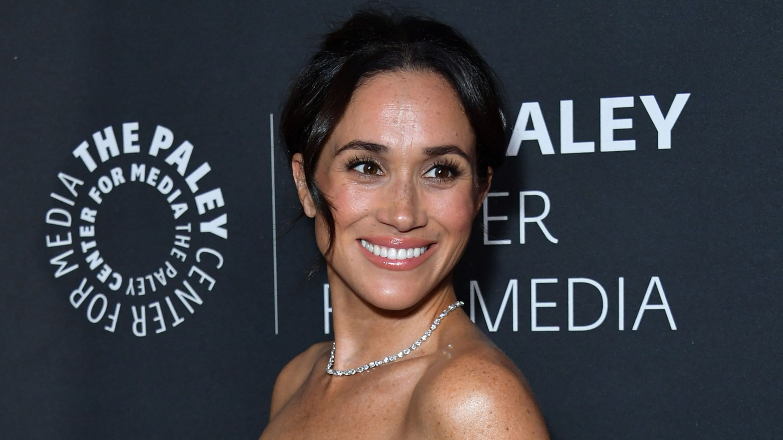 Meghan Markle Defies Royal Standards In Daring Strapless Black Dress