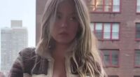 Sydney Sweeney looks stunning as she goes braless on a balcony in New York