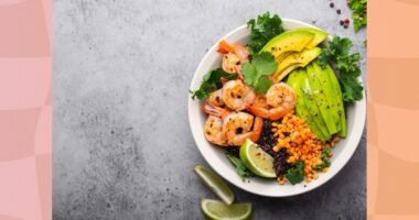 bowl of kale, avocado, lentil, and shrimp salad