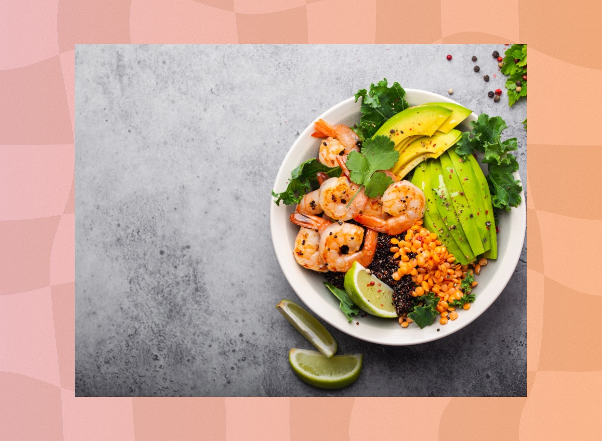 bowl of kale, avocado, lentil, and shrimp salad