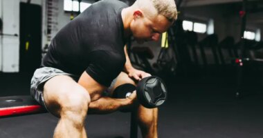 fit man lifting weights, concept of strength training habits that destroy your body before 40