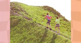 two fit female friends walking uphill, hiking for exercise on sunny day