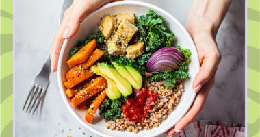 woman holding bowl of vegetables sweet potatoes avocado tofu hemp seeds onion kale grains