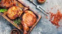 pork chops on cutting board