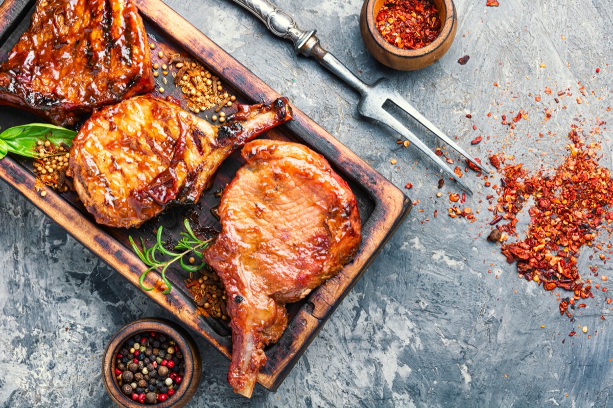 pork chops on cutting board