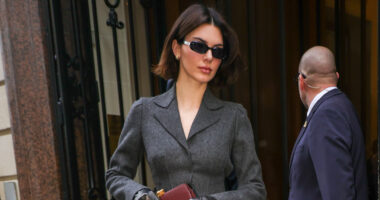 A-lister dons leather gloves and a suit for Hermes shopping spree while in Paris – can you tell who it is?