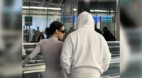 Bianca Censori shows off her underwear in see-through white jumpsuit at Tokyo airport with husband Kanye West