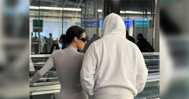 Bianca Censori shows off her underwear in see-through white jumpsuit at Tokyo airport with husband Kanye West