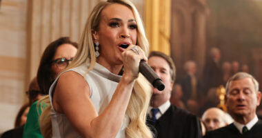 Carrie Underwood’s son Isaiah, 9, and husband Mike Fisher make rare appearance after her performance at inauguration