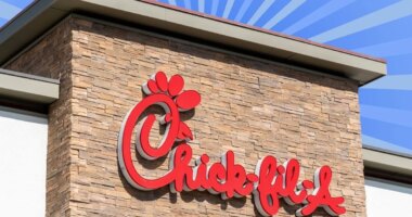 Chick-fil-A store on striped blue background