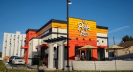 Los Angeles, CA, USA - May 10, 2022: Exterior view of an El Pollo Loco restaurant in Los Angeles. El Pollo Loco, Inc., is an American fast food chain specializing in Mexican-style grilled chicken.