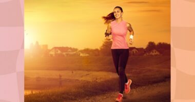 fit, happy woman running outdoors at sunset or sunrise through train in town by the water