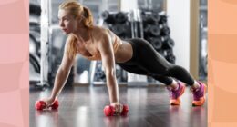 fit blonde woman doing dumbbell renegade row or pushup in gym