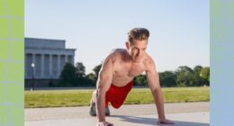 fit, shirtless man doing high plank exercise, gearing up for burpees outdoors on sidewalk