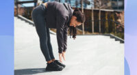 Woman touching her toes