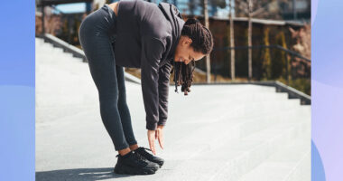 Woman touching her toes