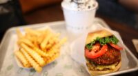 Cheeseburger with French Fries and Milkshake Meal on Tray Fast Food.