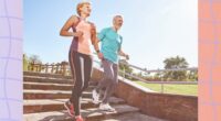 fit, mature couple running outdoors down stairs for exercise on sunny summer day