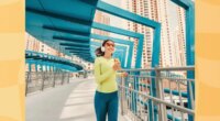 fit woman jogging across bridge for exercise