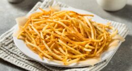 Homemade Shoesttring French Fries with Salt and Ketchup