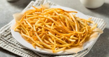 Homemade Shoesttring French Fries with Salt and Ketchup