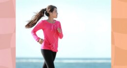 woman power walking on the beach on clear, sunny day