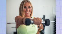 Woman lifting weights, strength training