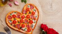 Heart,Shaped,Italian,Pizza,With,Salami,cherry,Tomatoes,garlics,parsley,pizza,Sauce,mozzella,And,Olive