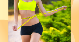 fit woman close-up measuring waistline outside