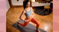 woman doing walking lunges in living space