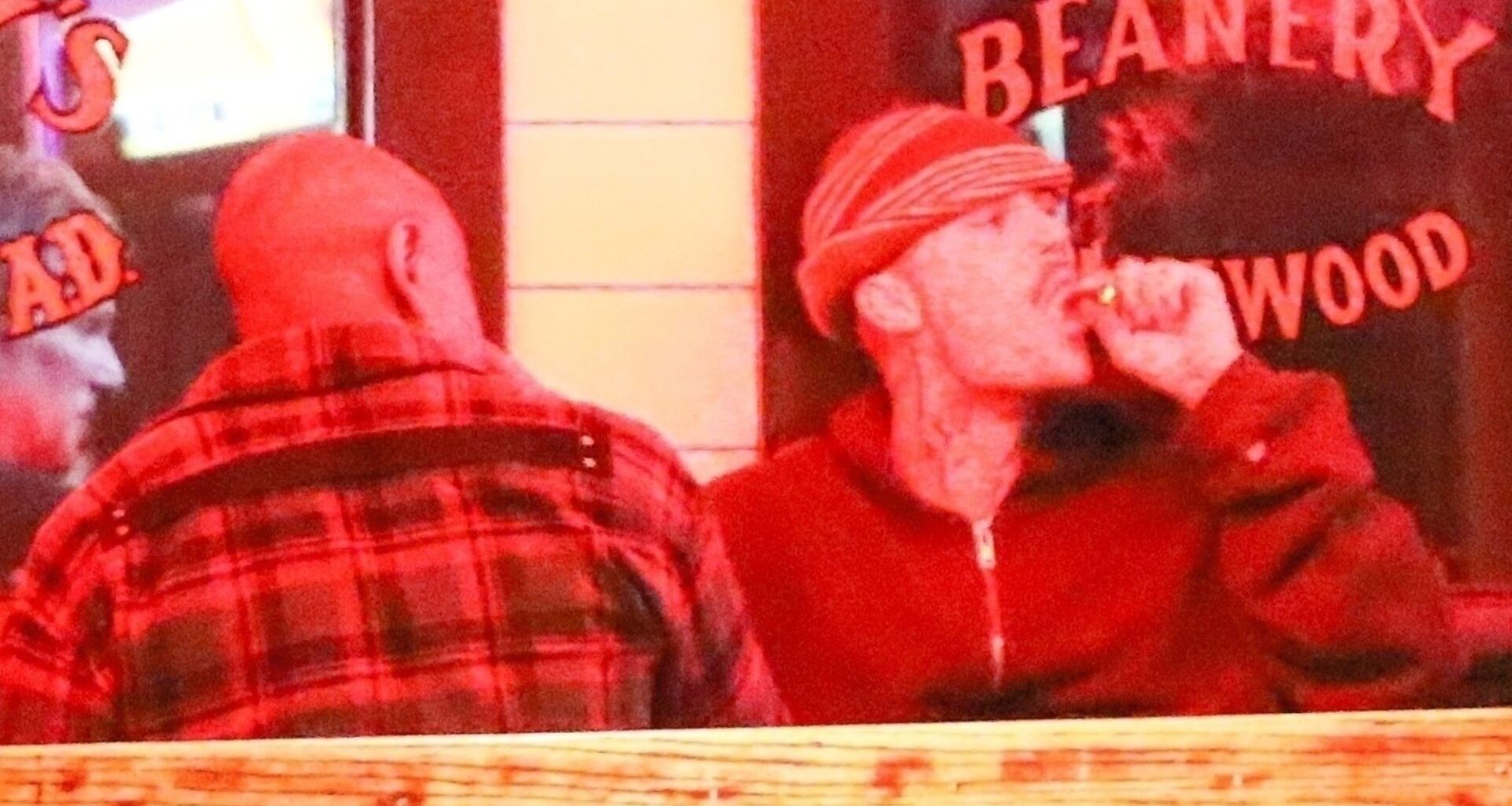 Dishevelled Justin Bieber pulls series of faces as he enjoys a smoke with Dave Chappelle on night out in LA