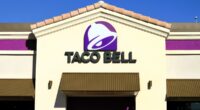 Chandler, arizona - Nov. 21 2023: Exterior of a modern Taco Bell store with sign. Charter Foods is a YUM Brands franchisee that operates Taco Bell and other fast-food restaurants in the U.S.