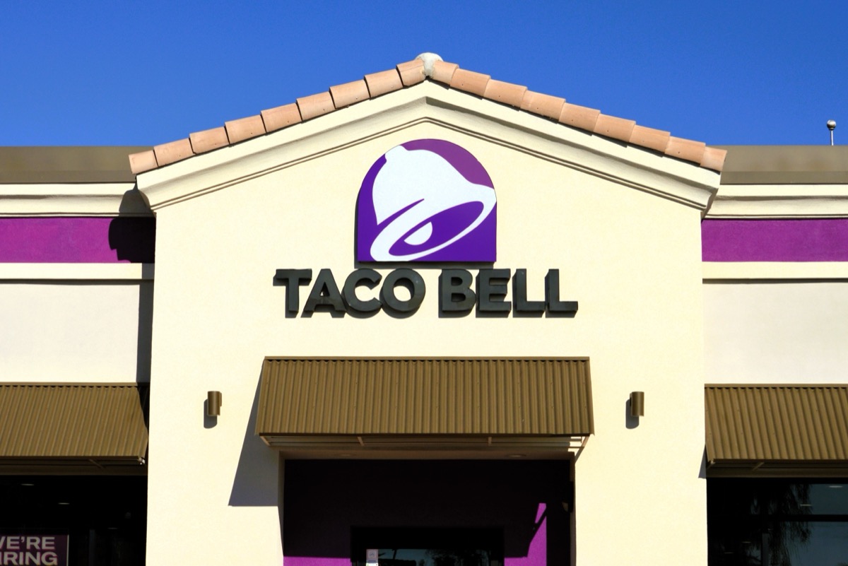 Chandler, arizona - Nov. 21 2023: Exterior of a modern Taco Bell store with sign. Charter Foods is a YUM Brands franchisee that operates Taco Bell and other fast-food restaurants in the U.S.