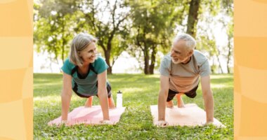 mature, happy couple doing high planks exercise in park on yoga mats on bright, sunny summer day