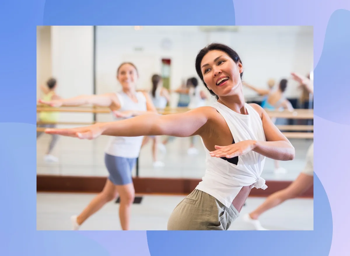 fit woman dancing in bright dance class studio